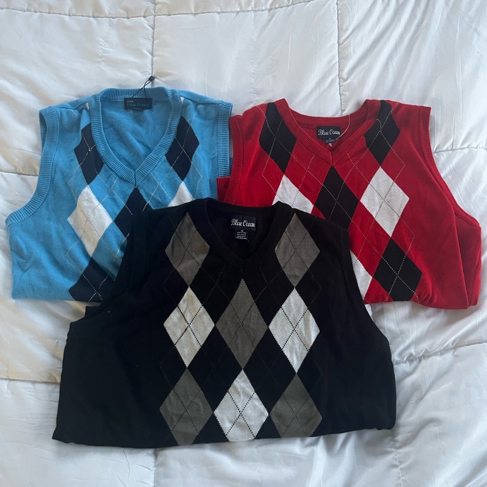 bundle of 3 argyle sweater vests: black, red, blue